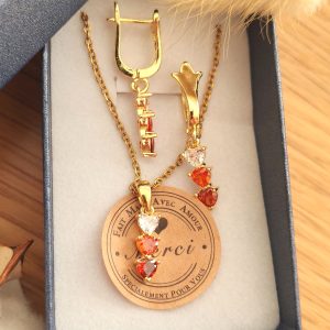 Box boucles d'oreilles et collier assortis